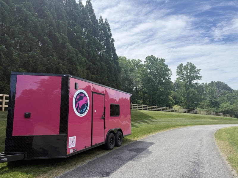 The Pink Pony Plunge trailer parked outdoors